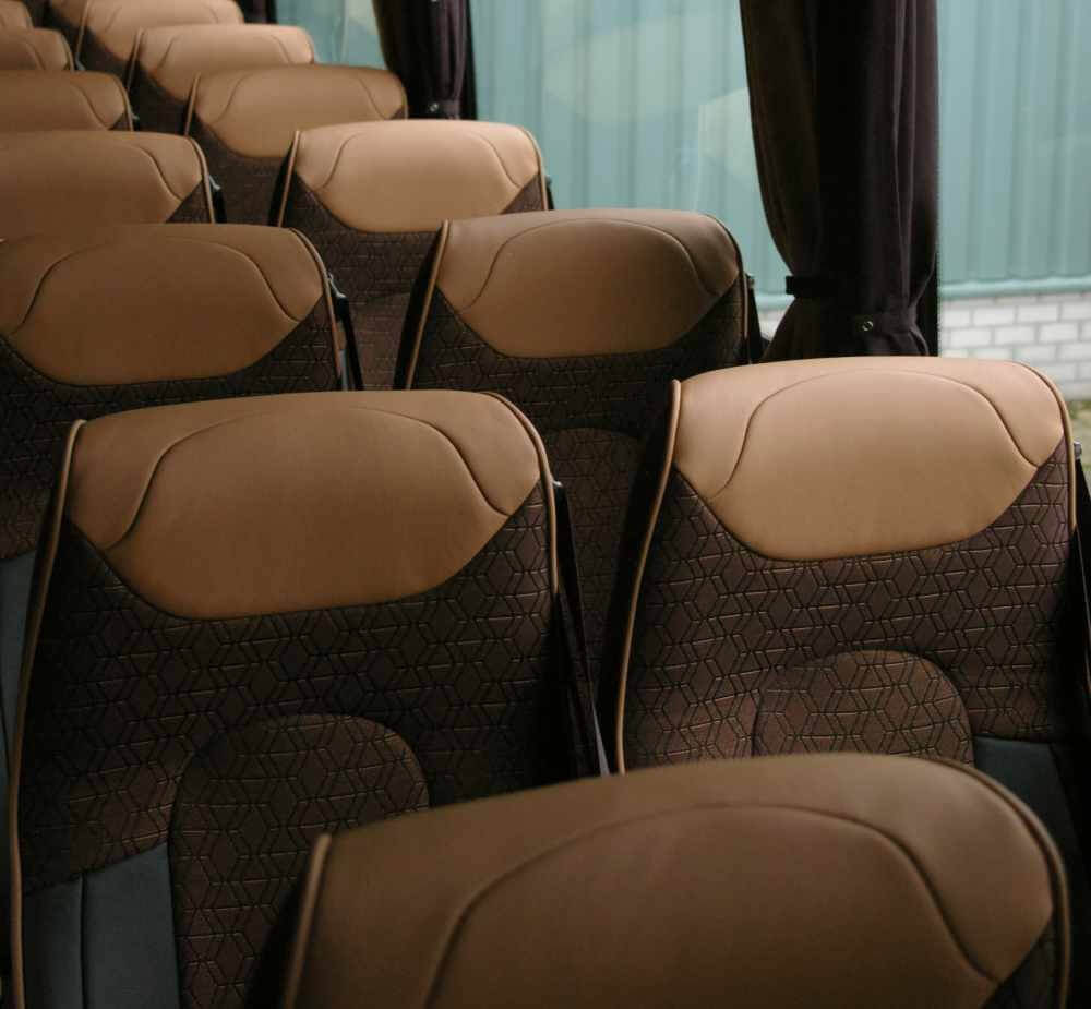 interior shot from one of our coaches showing rows of seats
